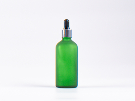 Grünglasflasche 100ml, mit Pipette silber-glanz
